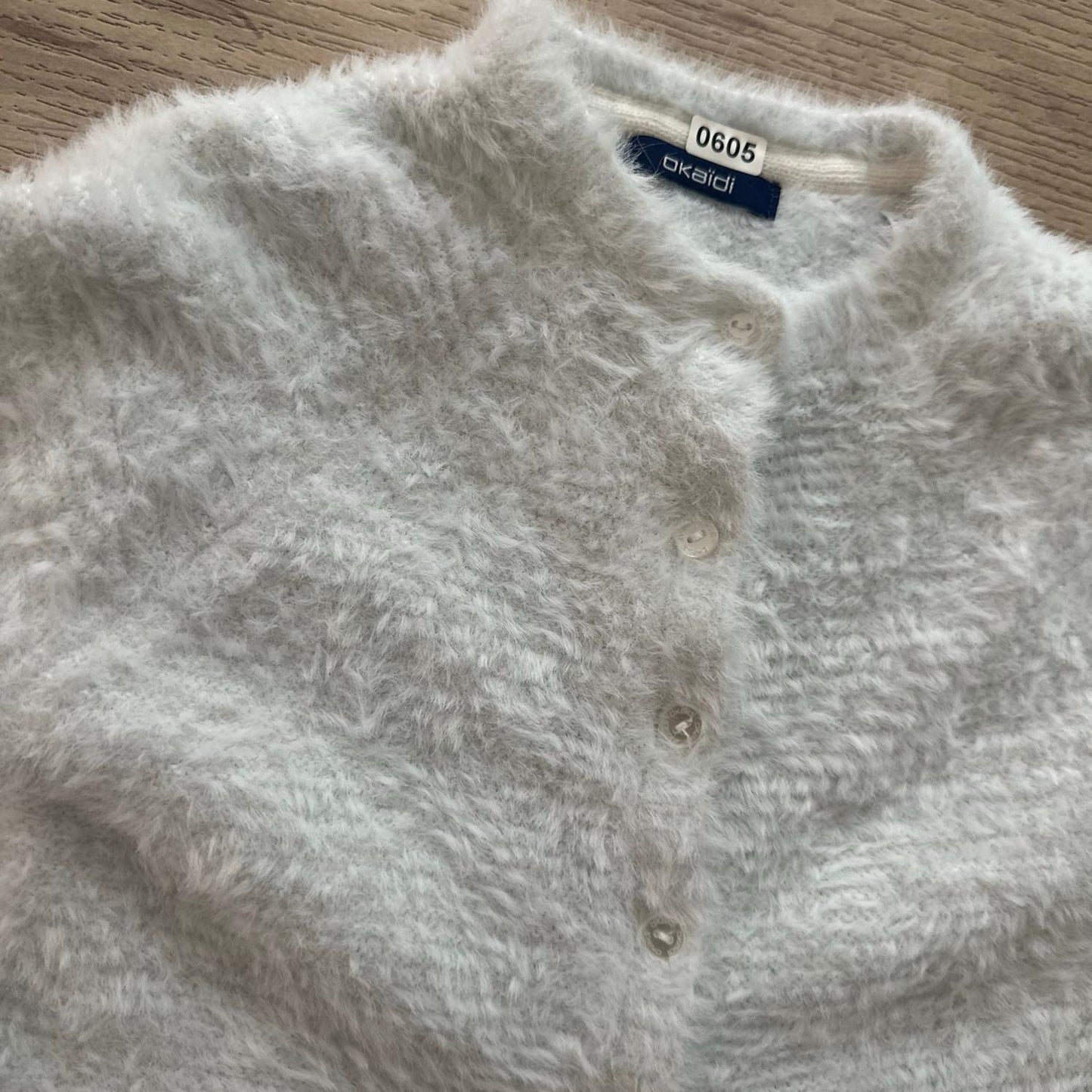 Gilet Okaïdi : 24 mois
