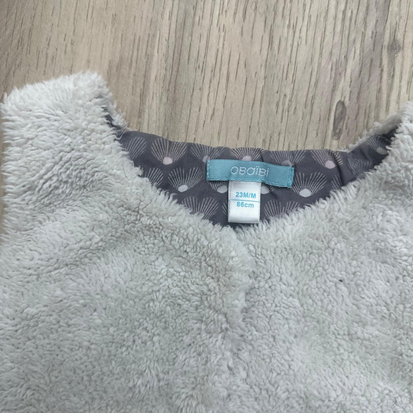 Gilet Okaïdi : 24 mois