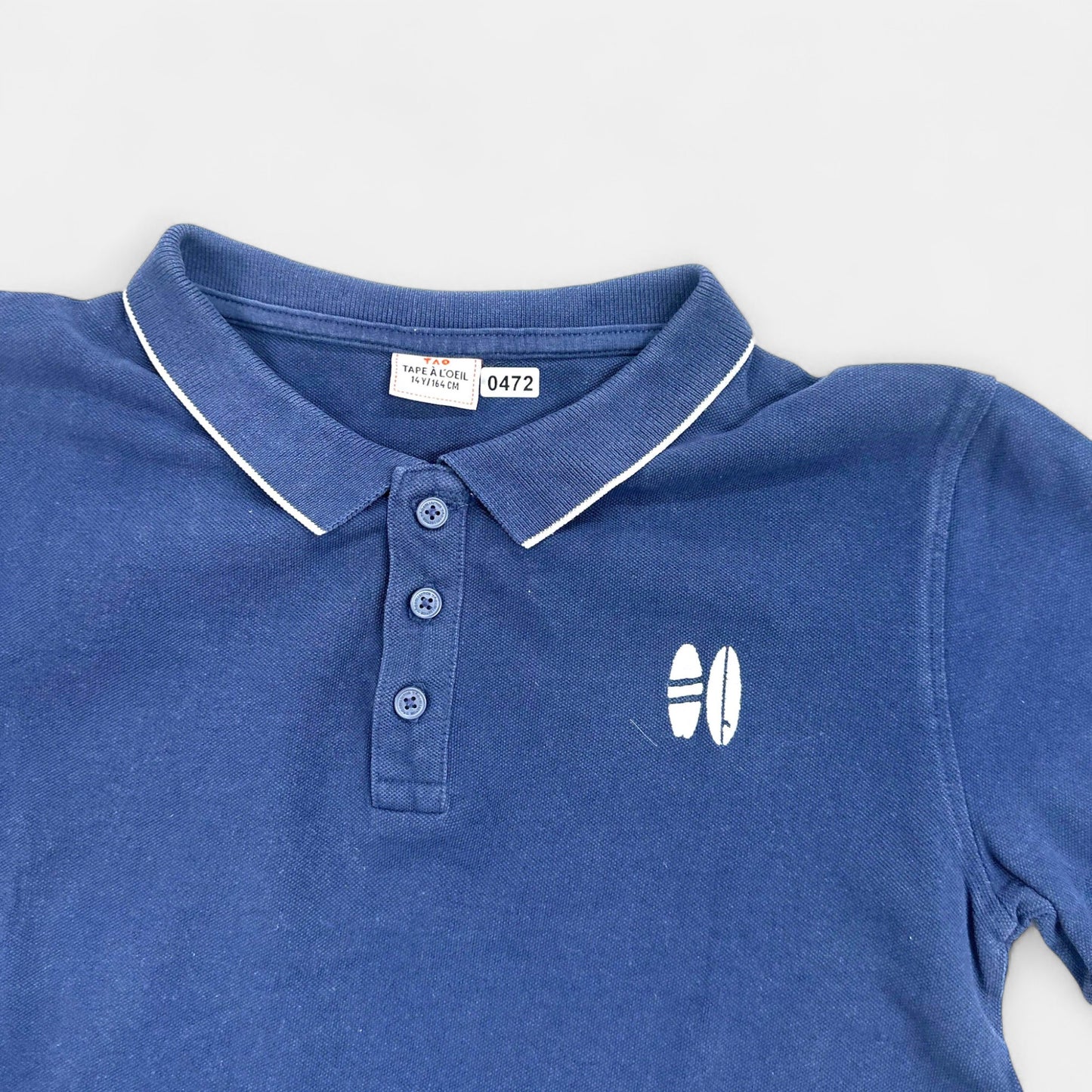 Polo Tape à l'oeil : 14 ans