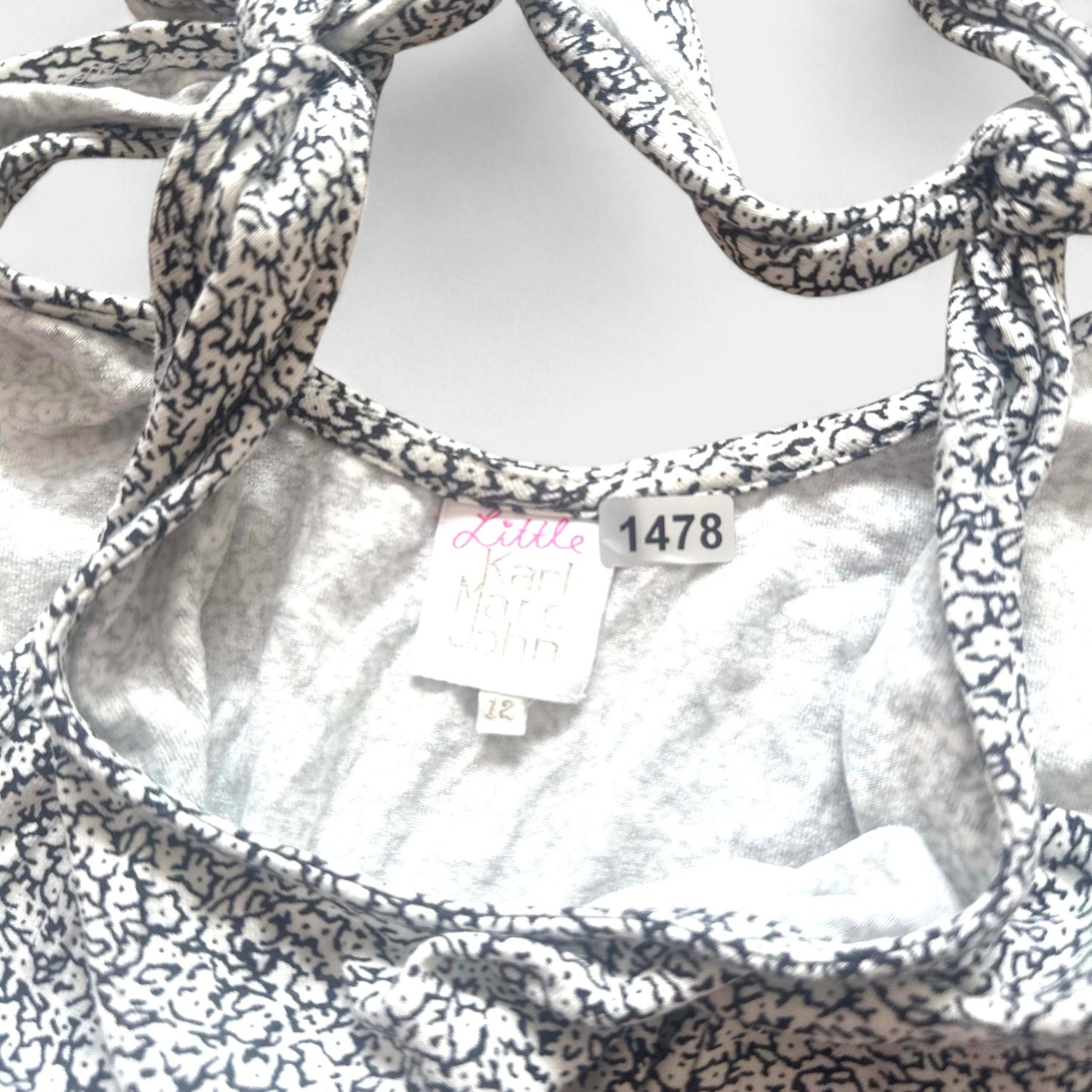 Combinaison karl Marc John : 12 ans