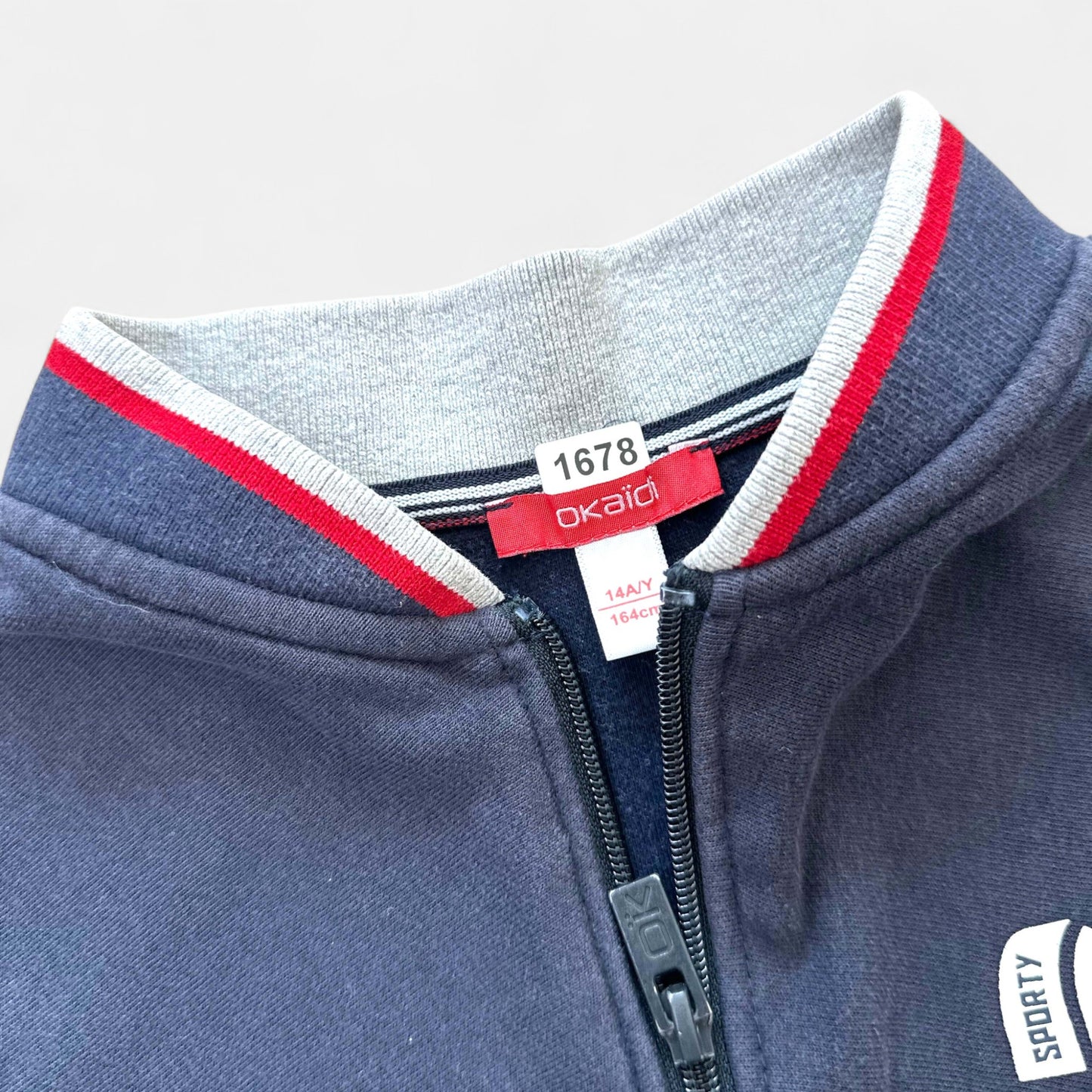 Gilet Okaïdi : 14 ans