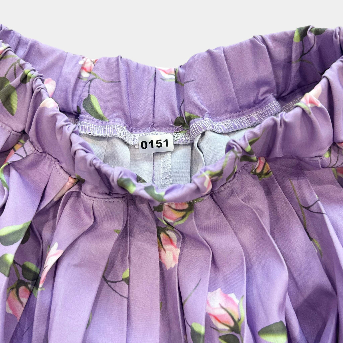 Jupe. Longue fleurs : 10 ans