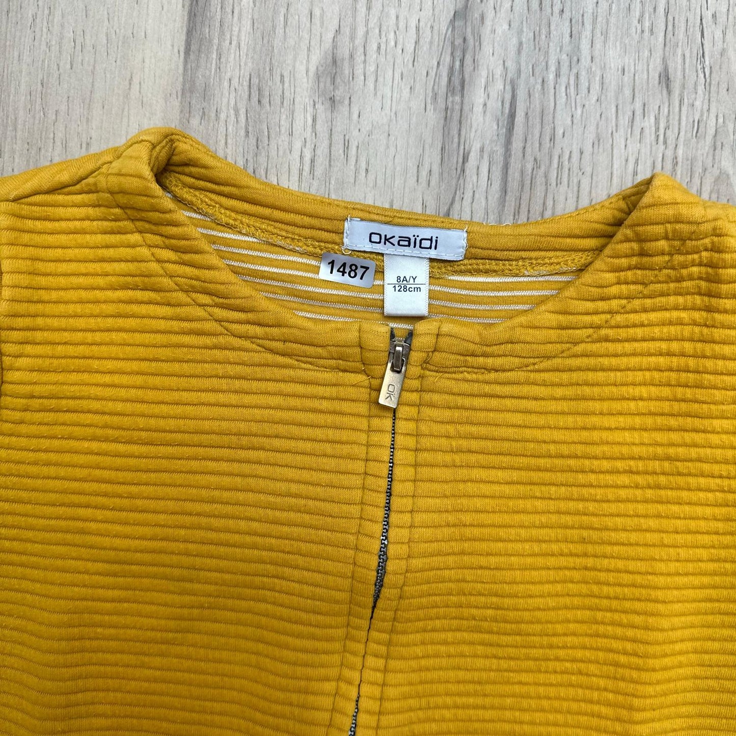 Gilet Okaïdi : 8 ans