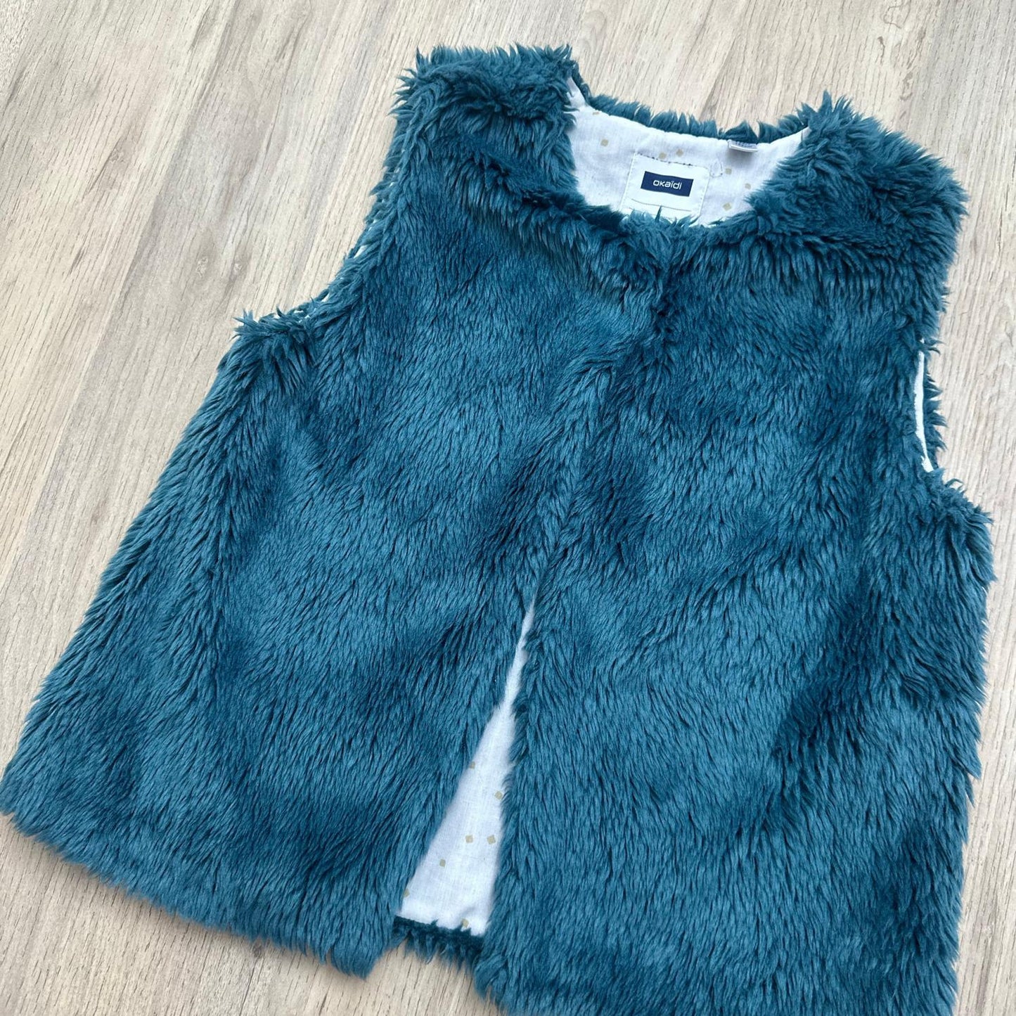 Gilet Okaïdi : 12 ans