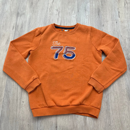 Pull orange : 14 ans