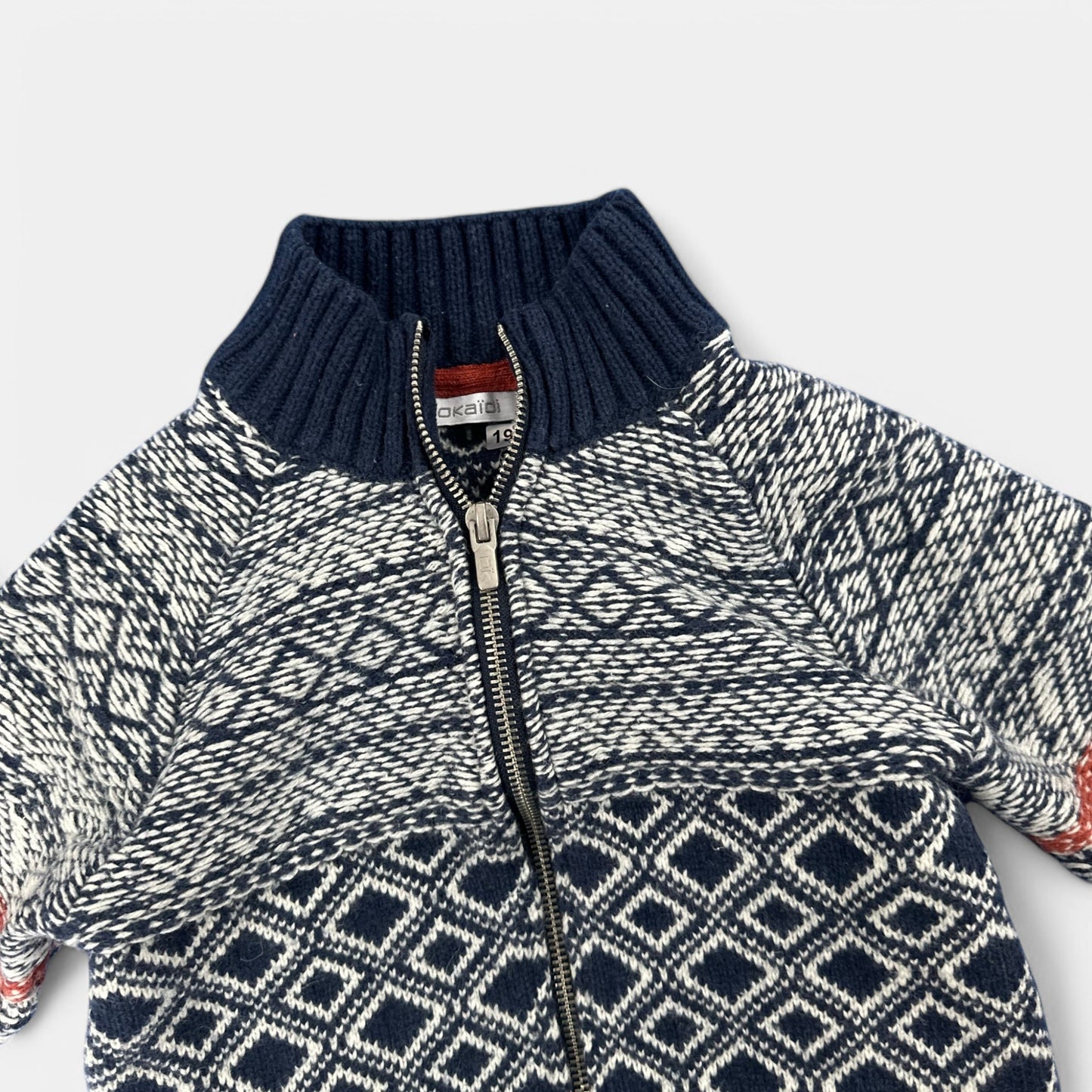 Gilet Okaïdi : 8 ans