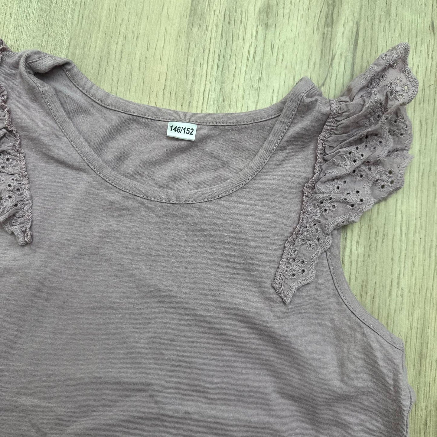 T-Shirt violet : 11 ans