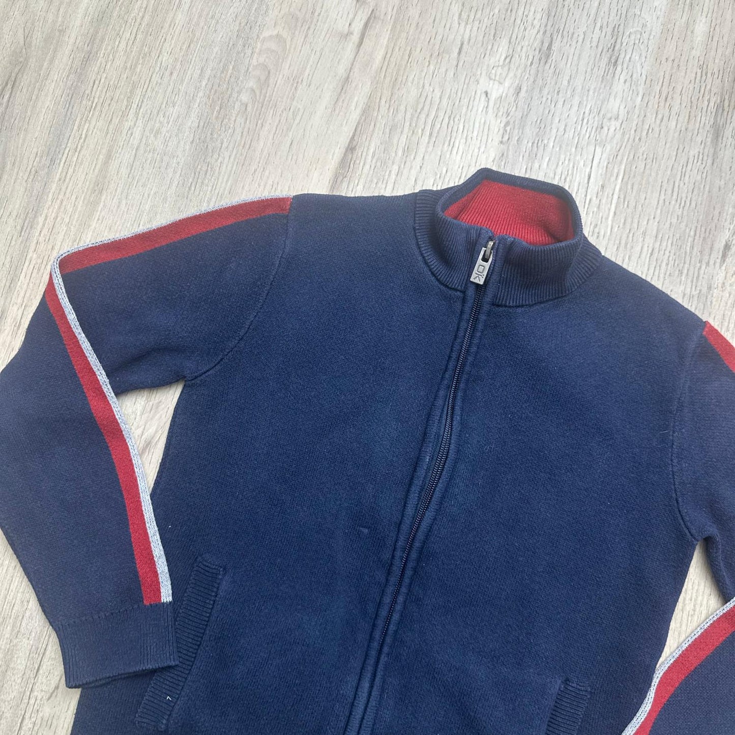 Gilet Okaïdi : 8 ans