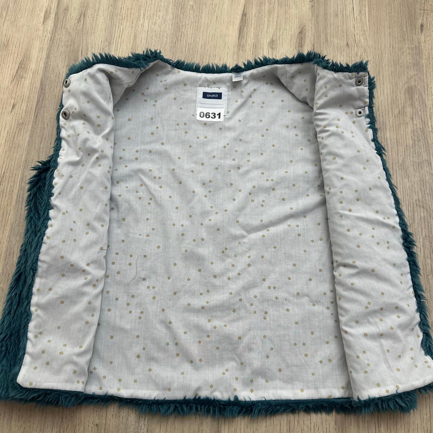 Gilet Okaïdi : 12 ans