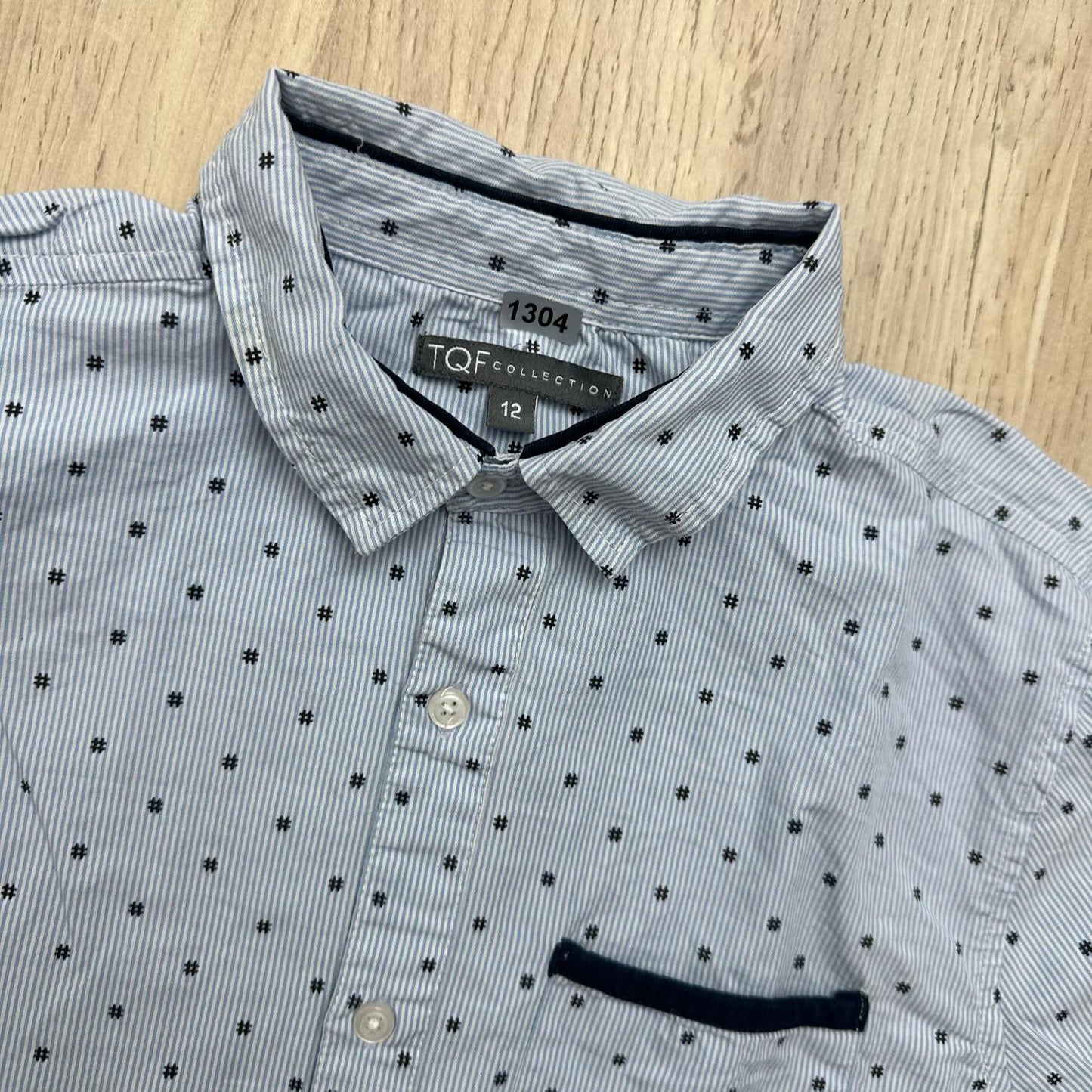 Chemise TQF : 12 ans