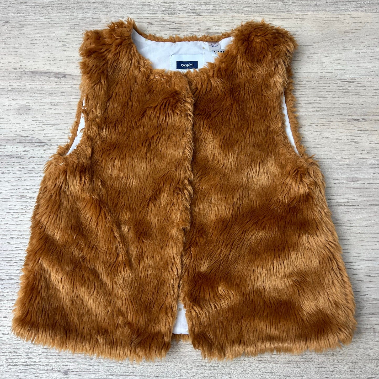 Gilet Okaïdi : 8 ans