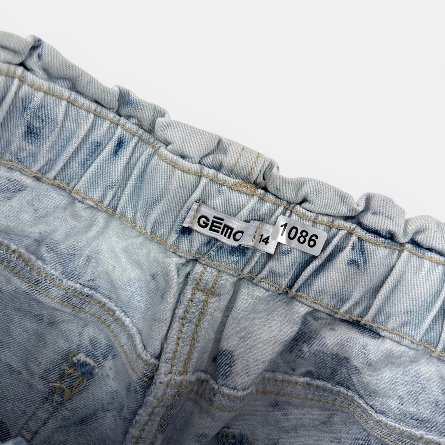 Short Gémo : 14 ans