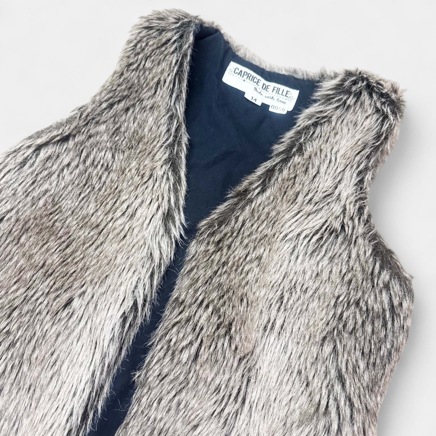 Gilet poil caprice de fille : 14 ans