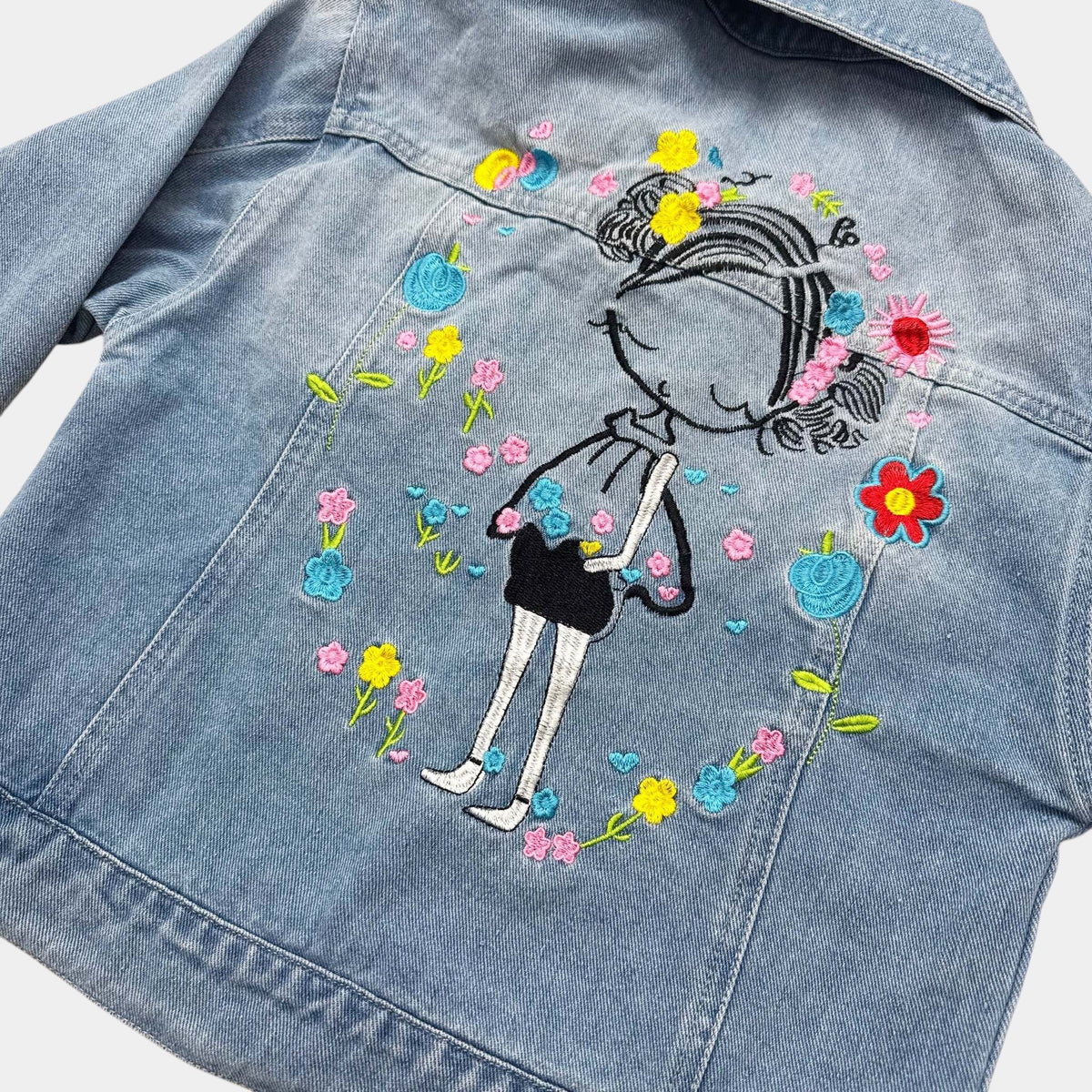 Veste jeans fleuris : 8 ans