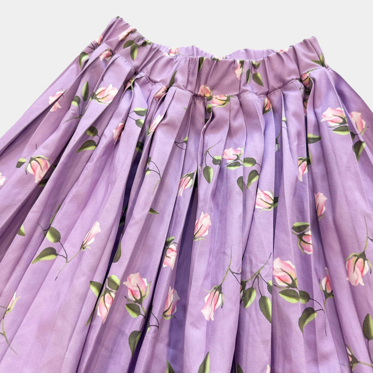 Jupe. Longue fleurs : 10 ans