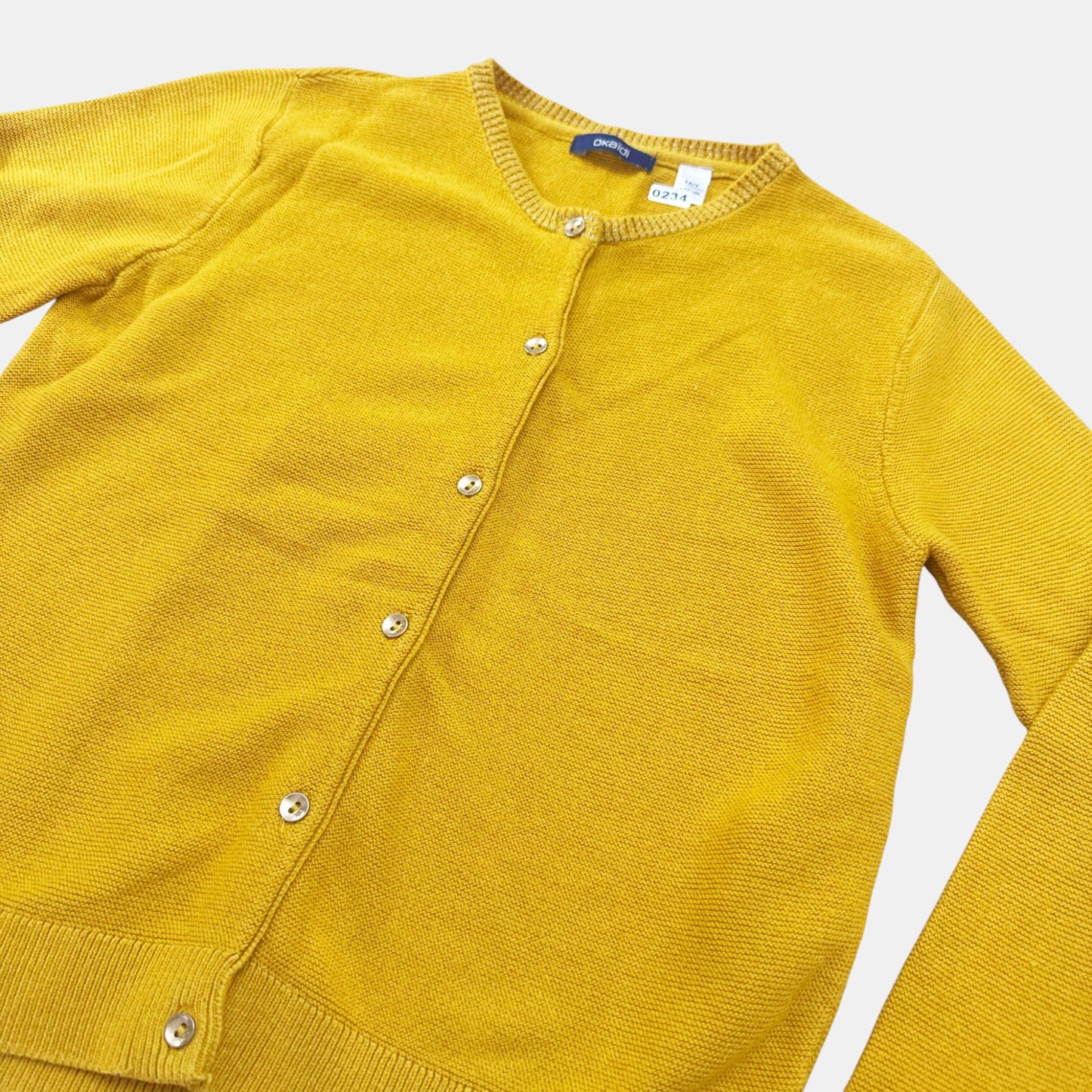 Gilet Okaïdi : 8 ans