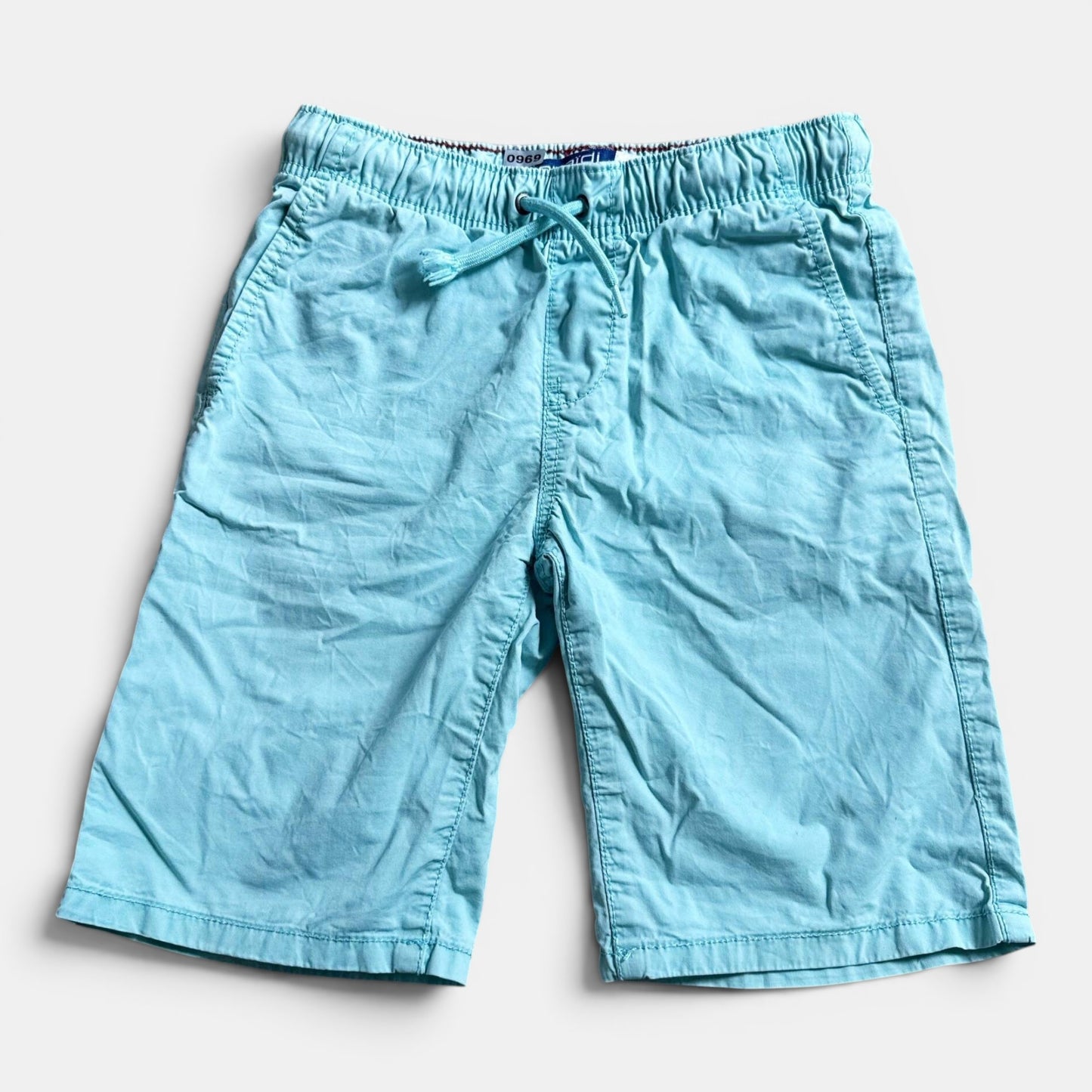 Short Okaïdi : 8 ans