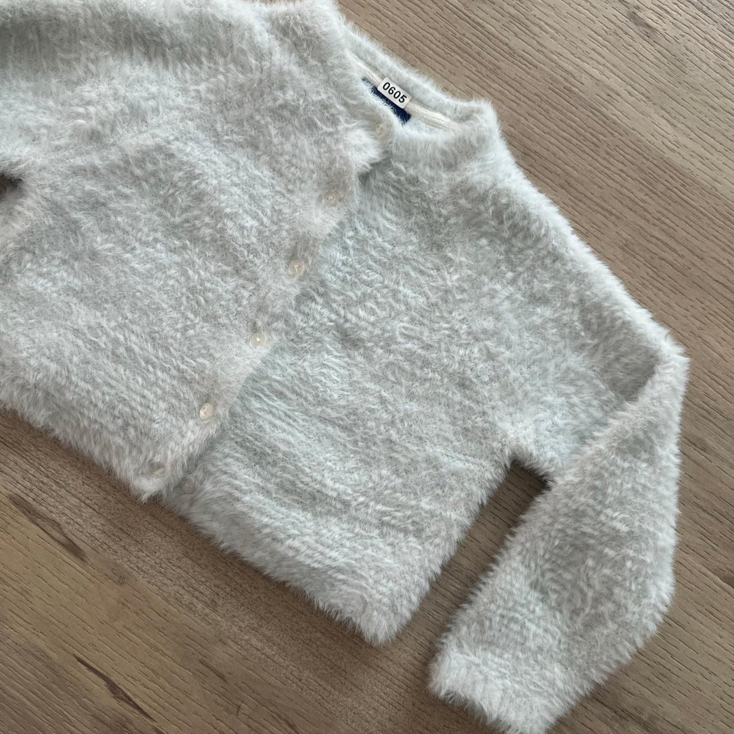 Gilet Okaïdi : 24 mois