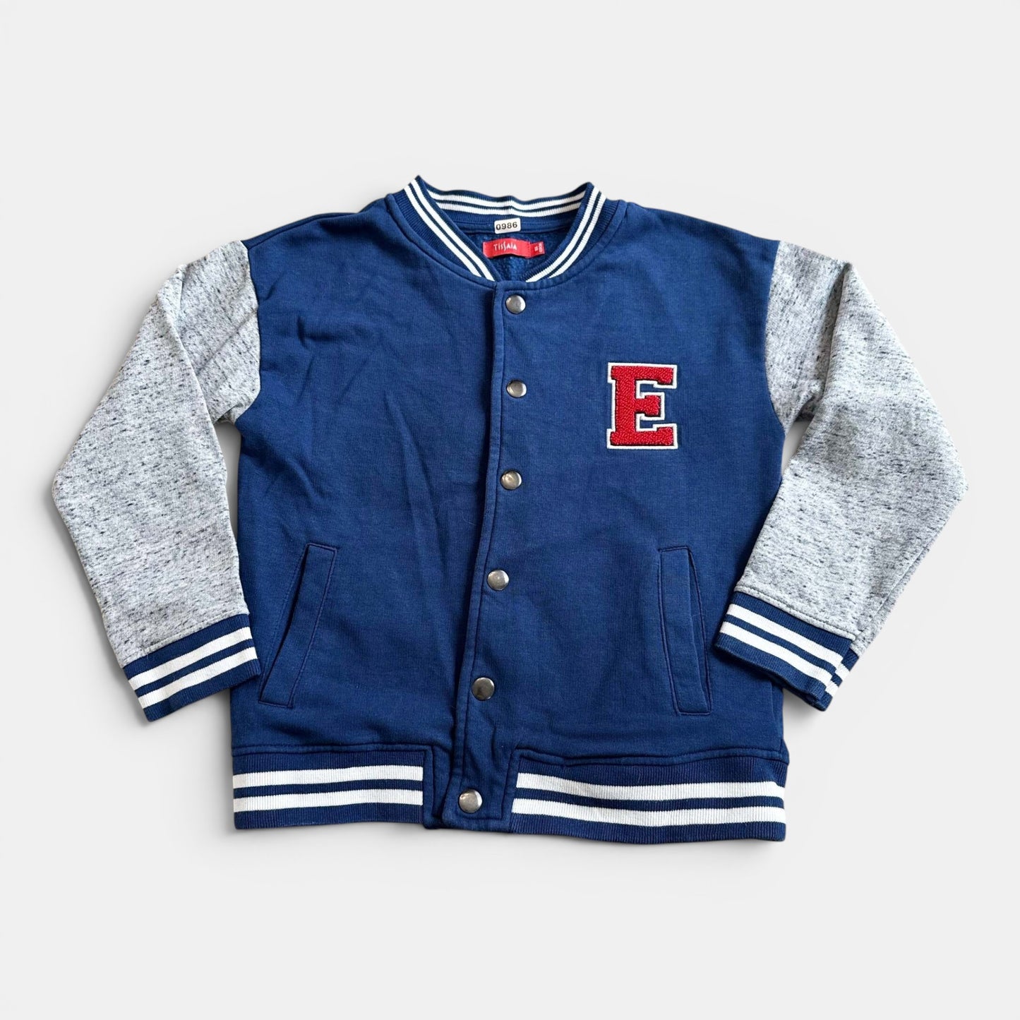 Veste / Manteau Tissaia : 8 ans