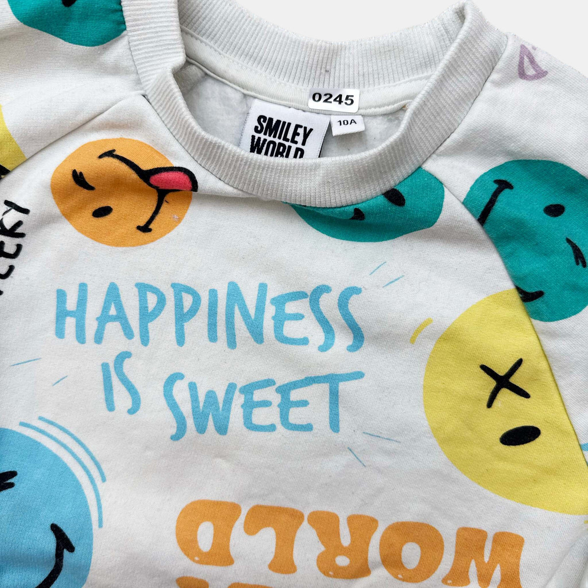 Pull smiley : 10 ans