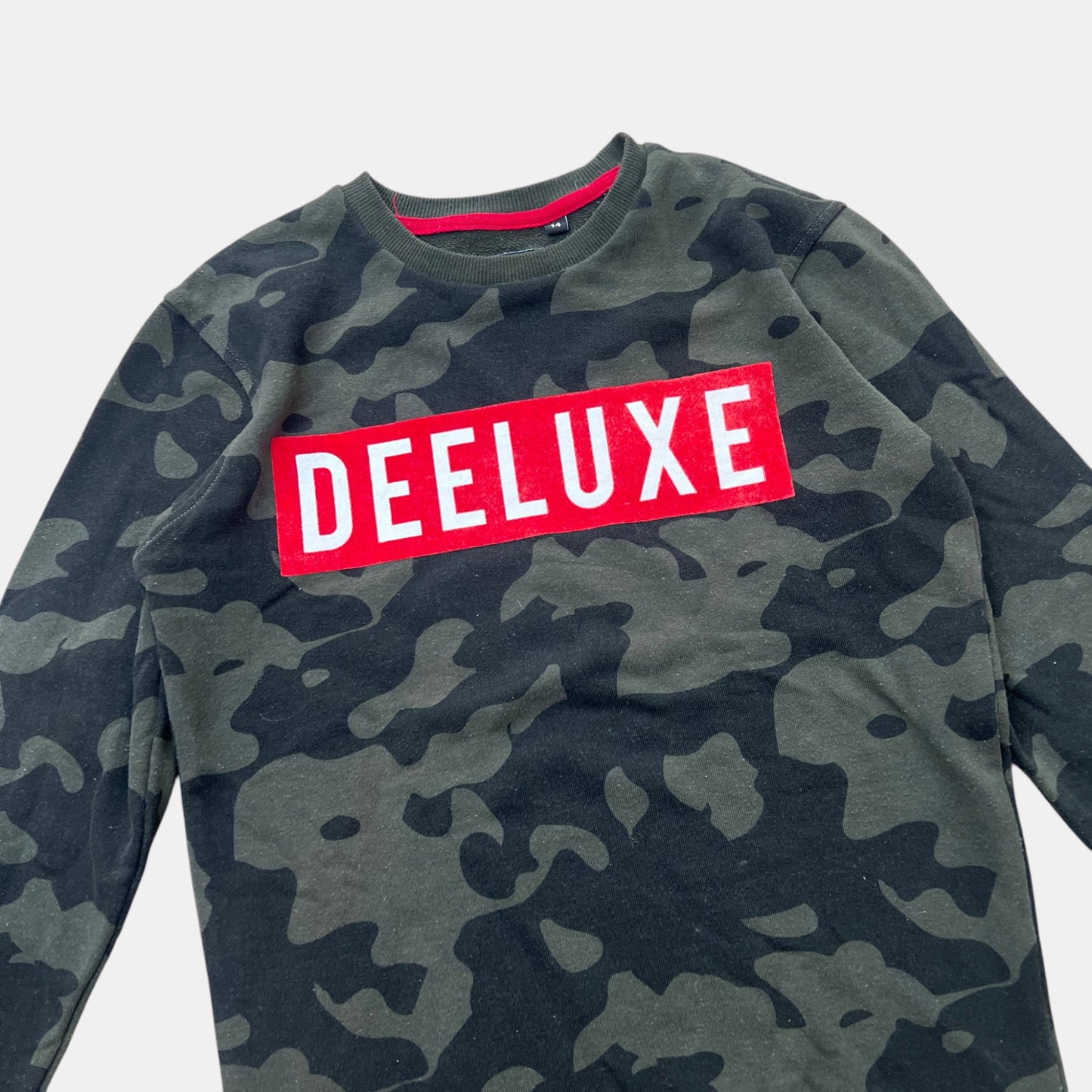 Pull Deeluxe : 14 ans