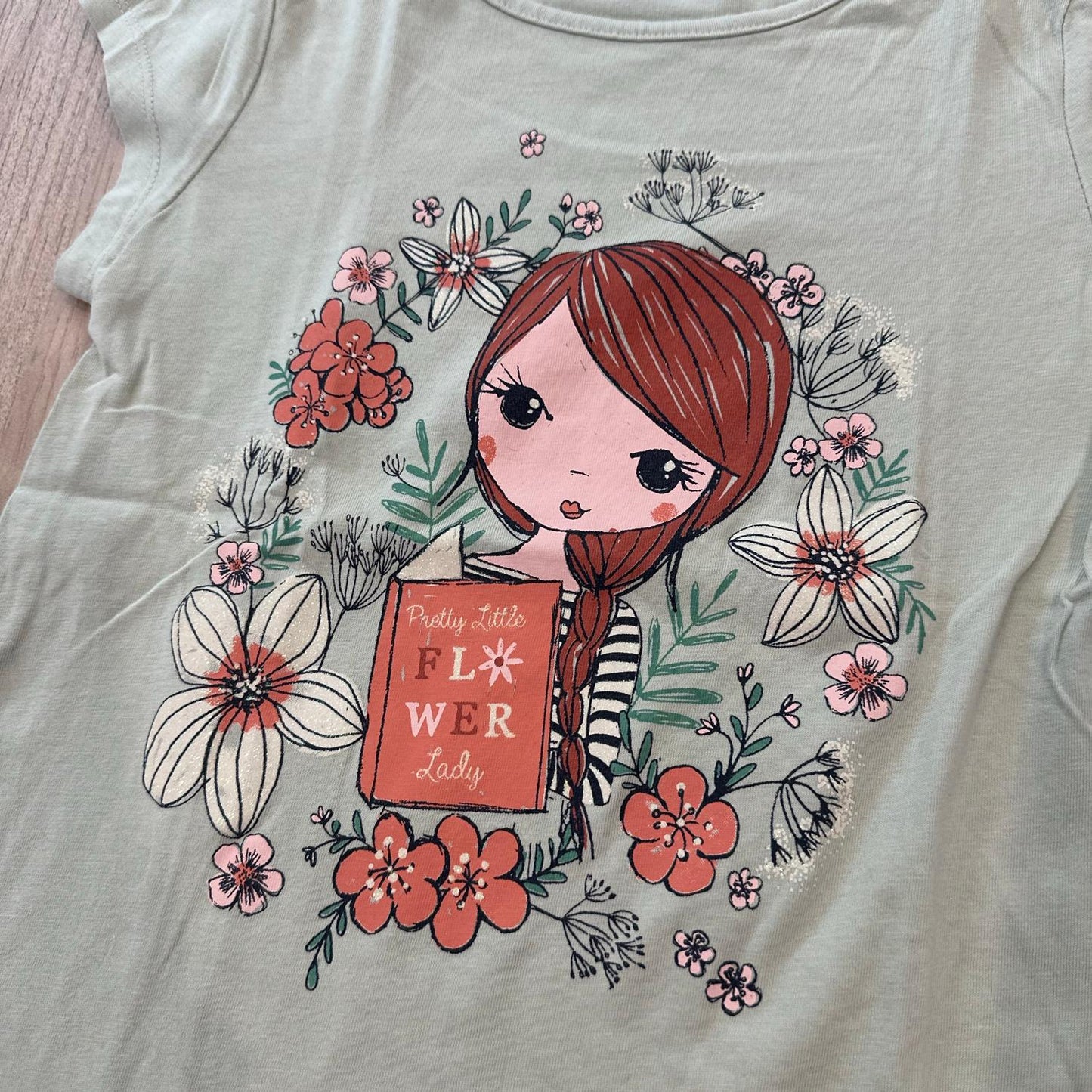 T-Shirt  vert fleurie : 9 ans