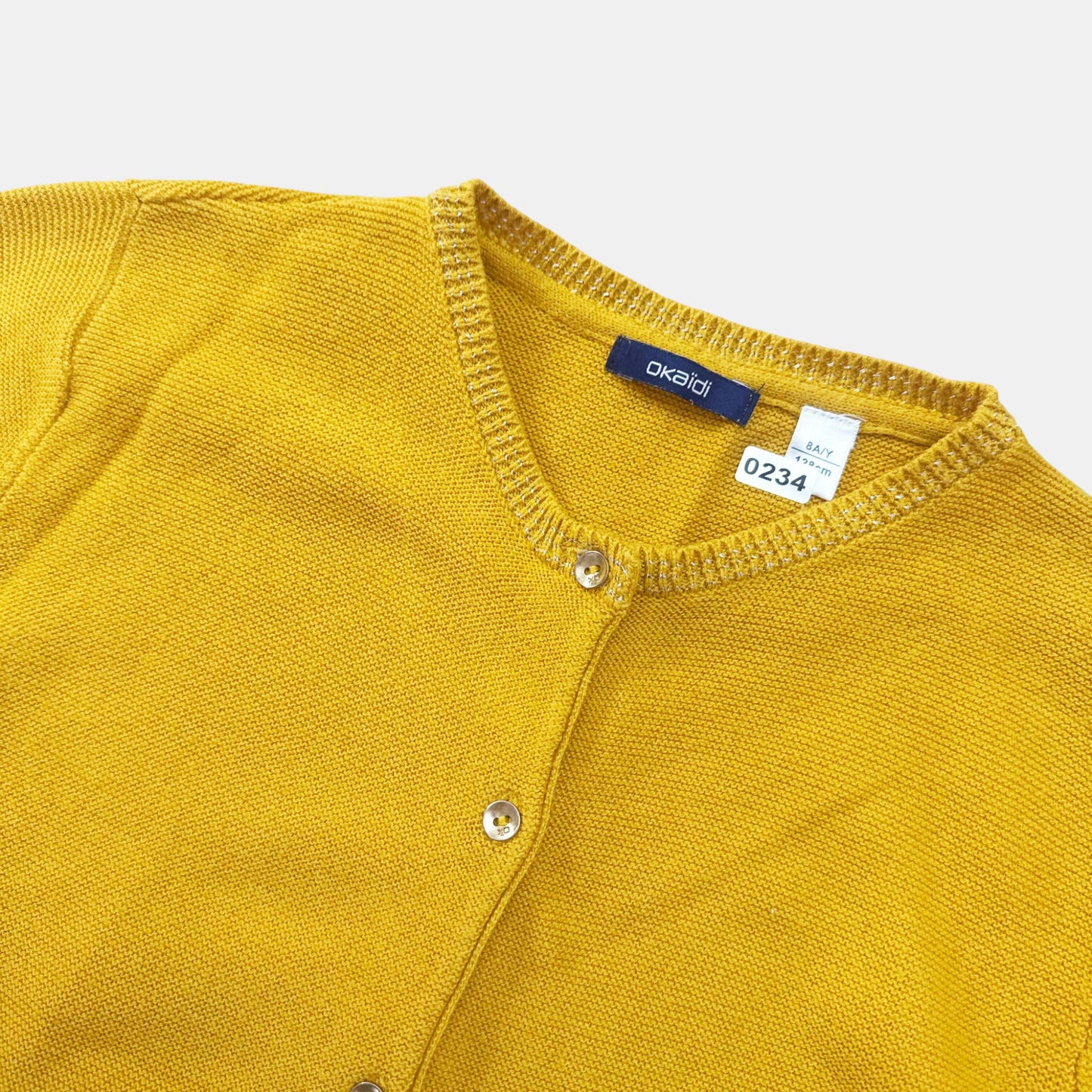 Gilet Okaïdi : 8 ans