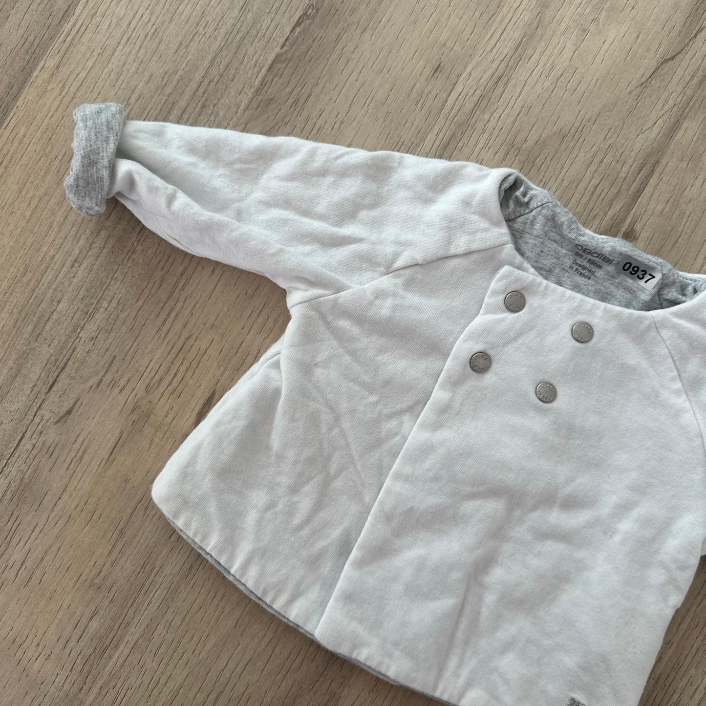 Gilet Okaïdi : 3 mois