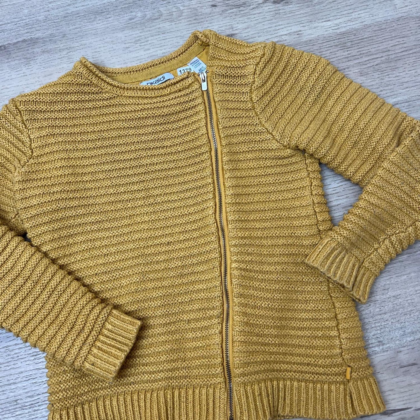 Gilet Okaïdi : 8 ans