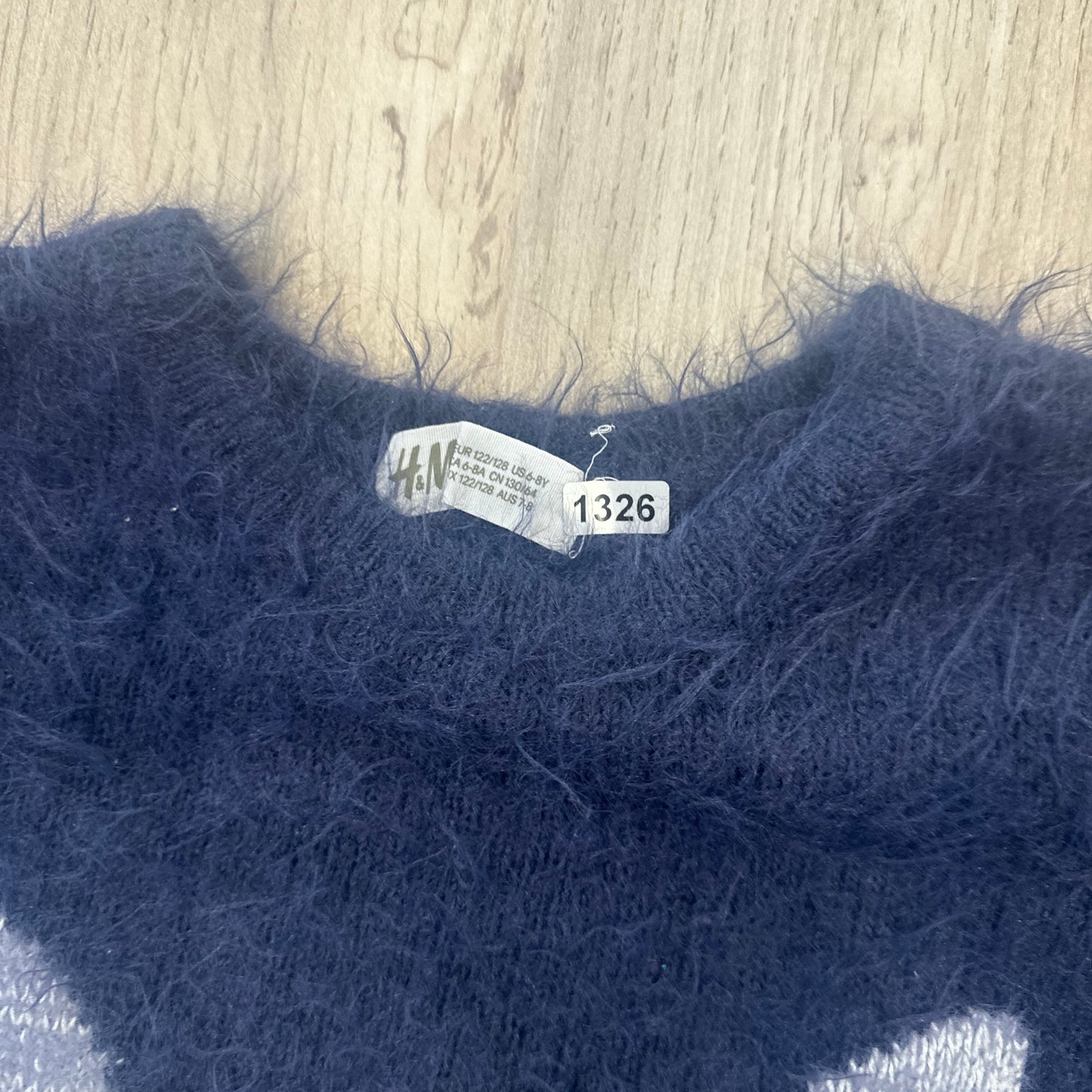 Pull H&M : 7 ans