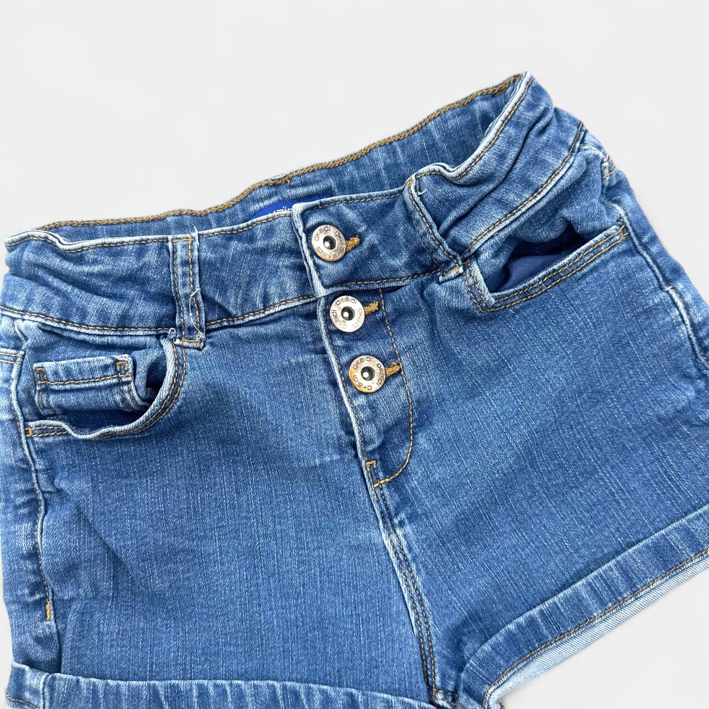 Short Okaïdi : 9 ans