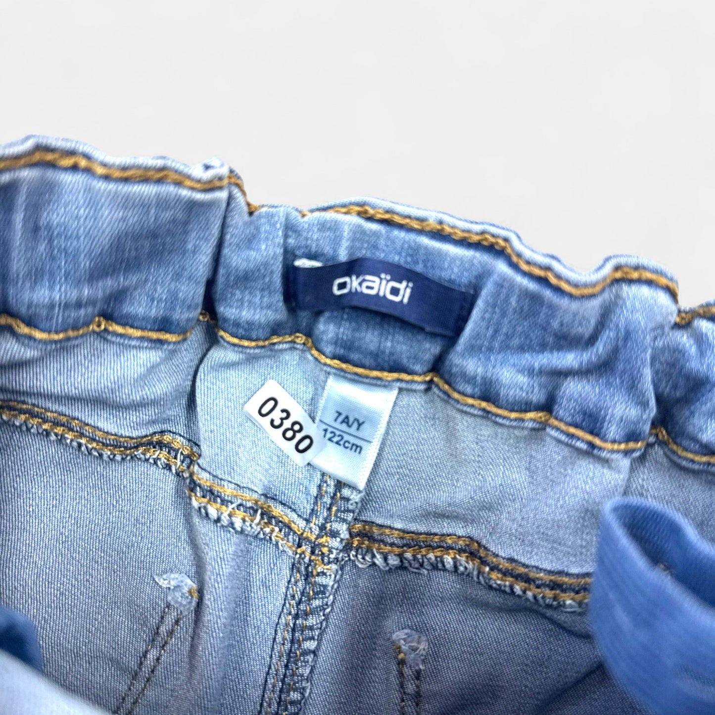 Short Okaïdi : 7 ans