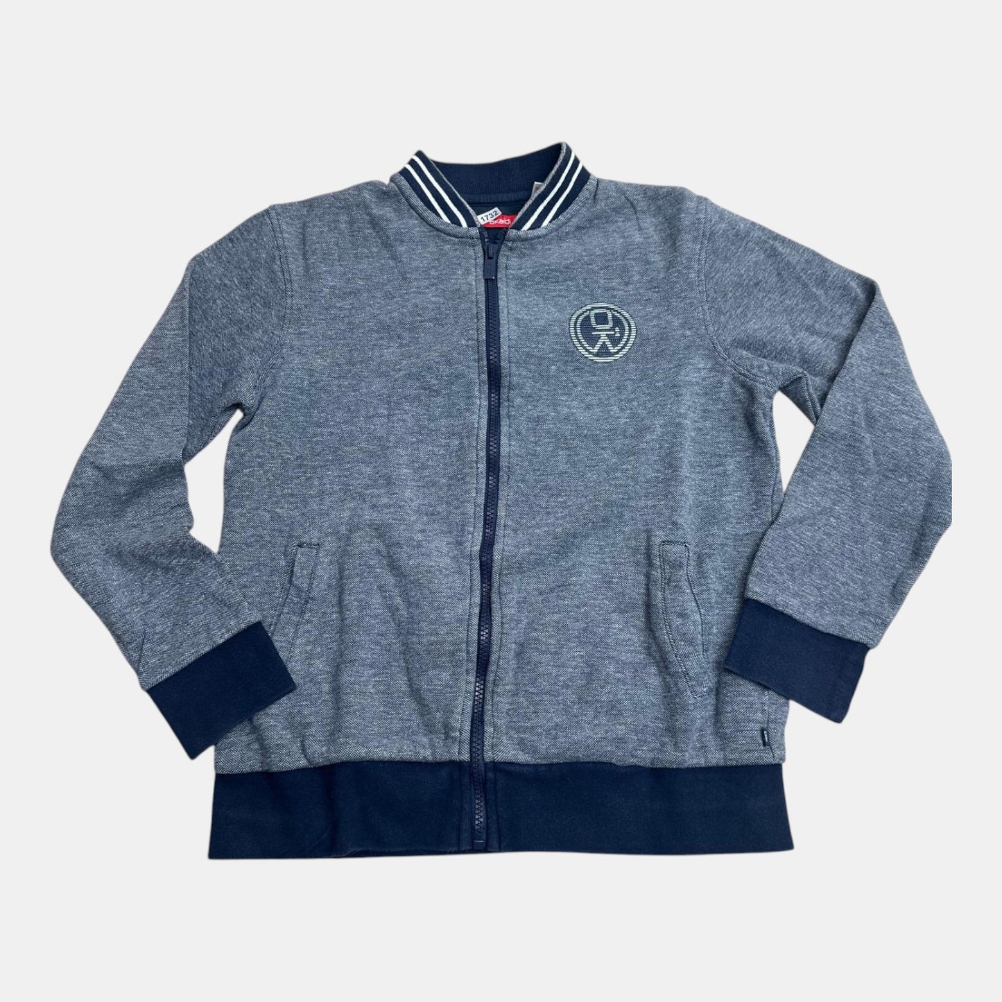 Gilet Okaïdi : 12 ans