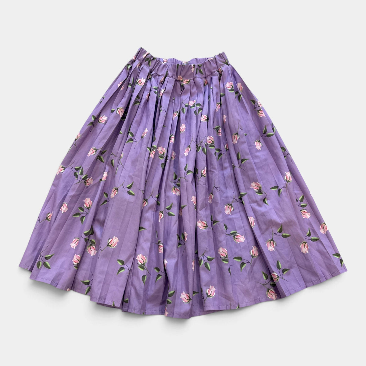 Jupe. Longue fleurs : 10 ans