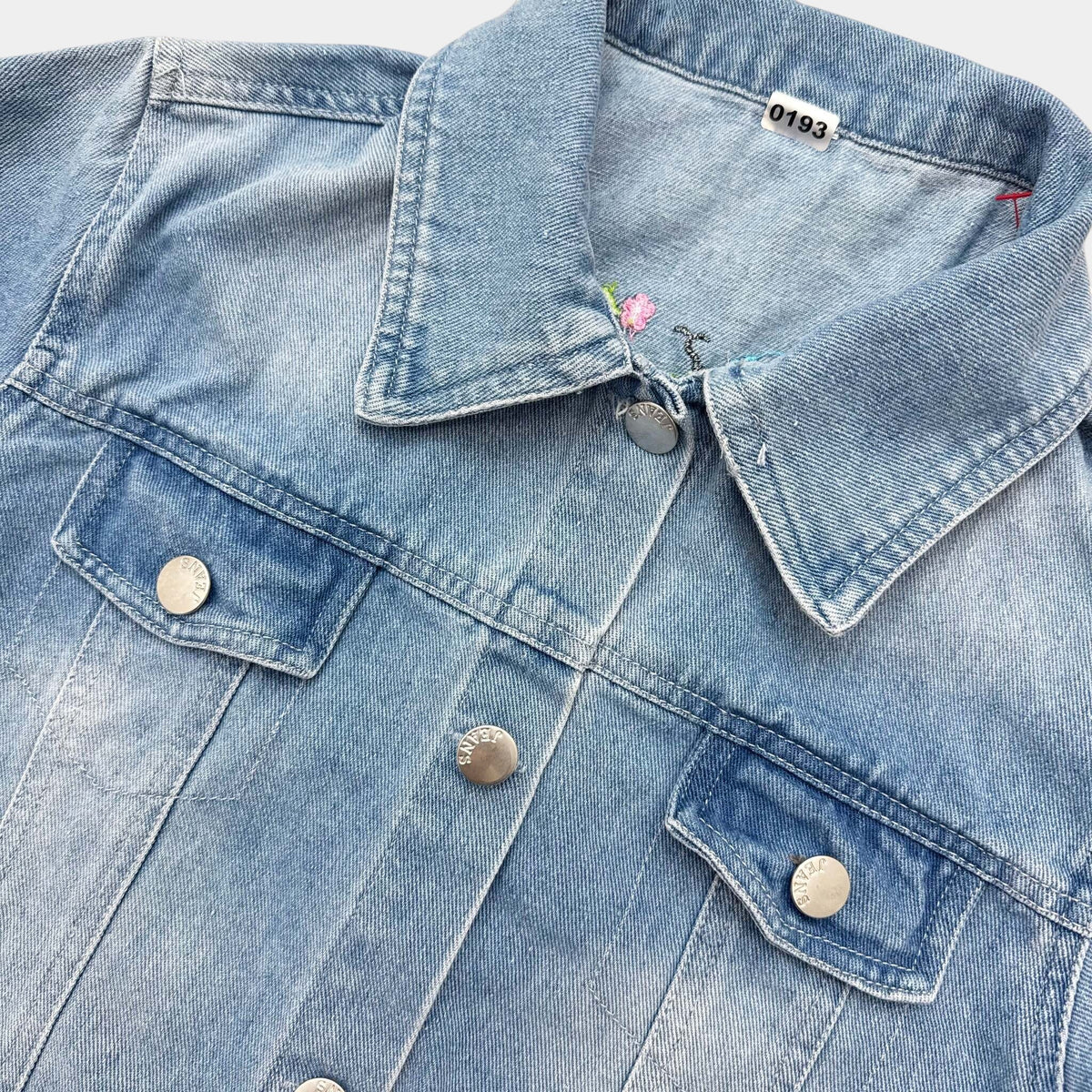 Veste jeans fleuris : 8 ans