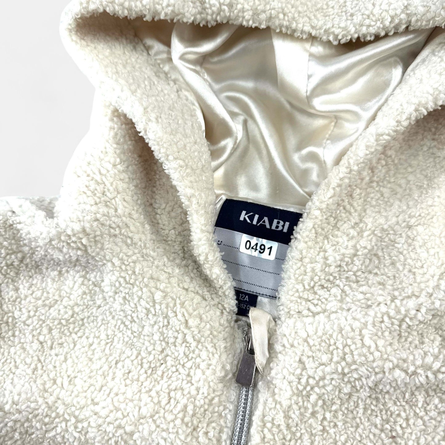 Veste  Kiabi : 12 ans