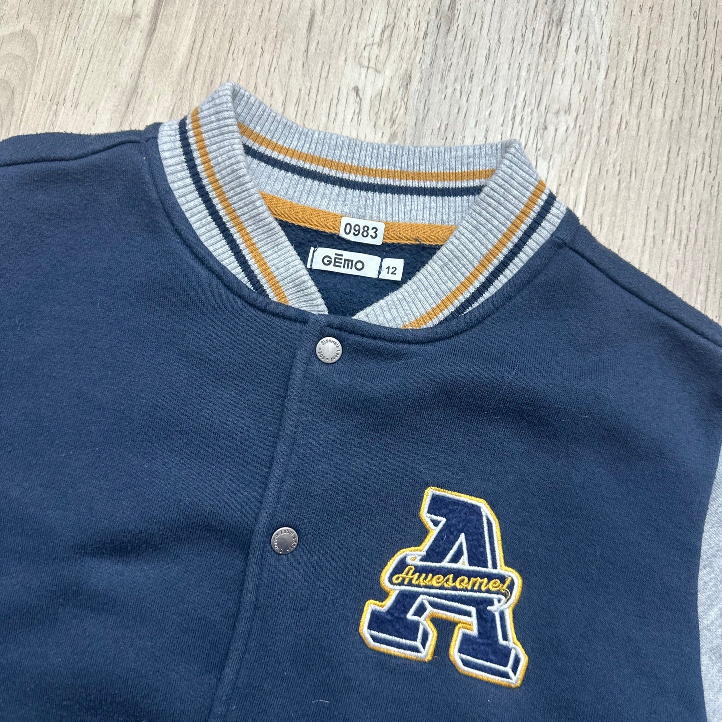 Gilet Gémo : 12 ans