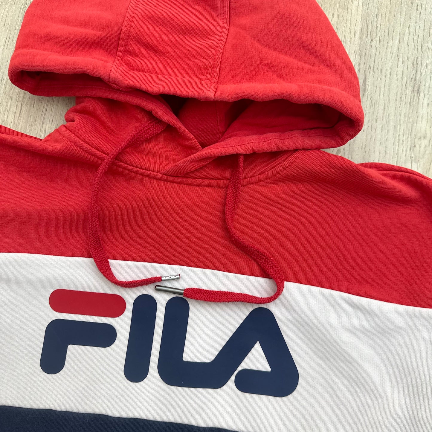 Pull fila : 16 ans