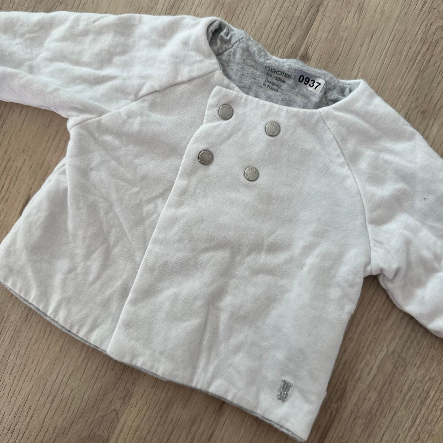 Gilet Okaïdi : 3 mois
