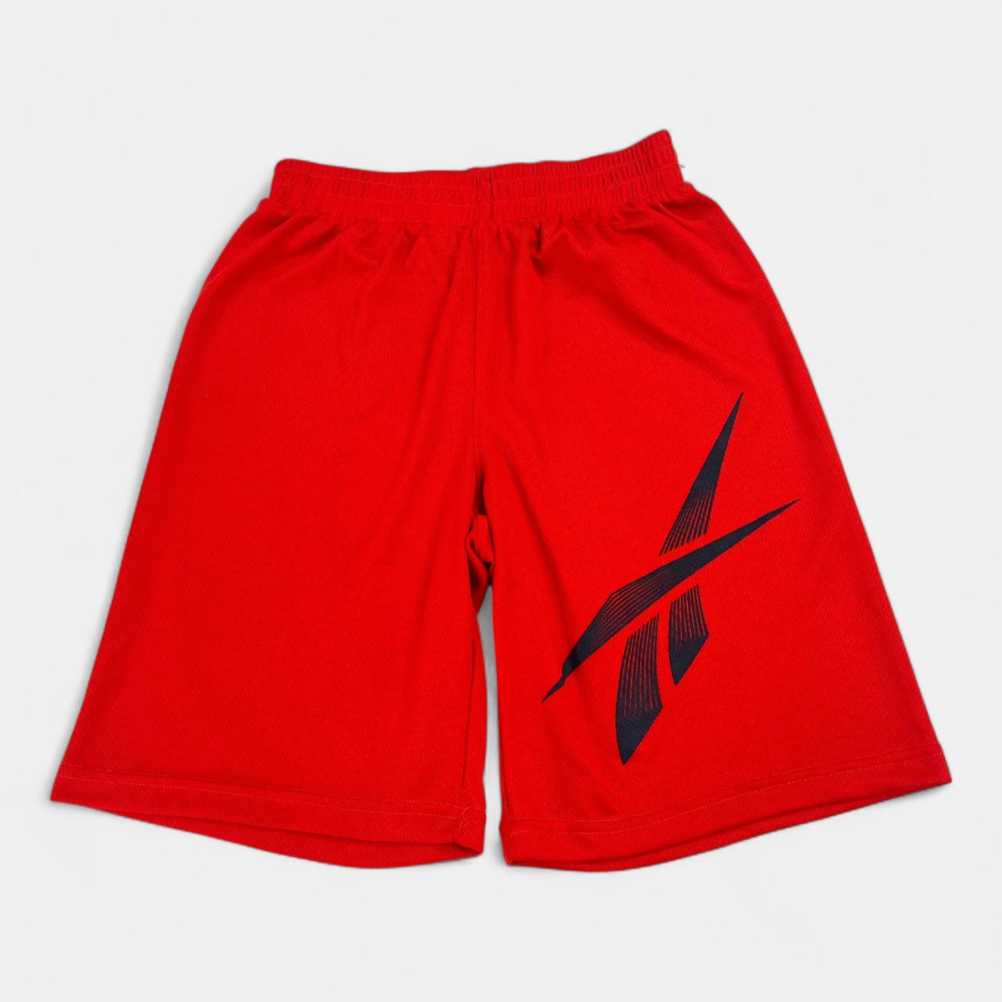 Short Reebok : 12 ans