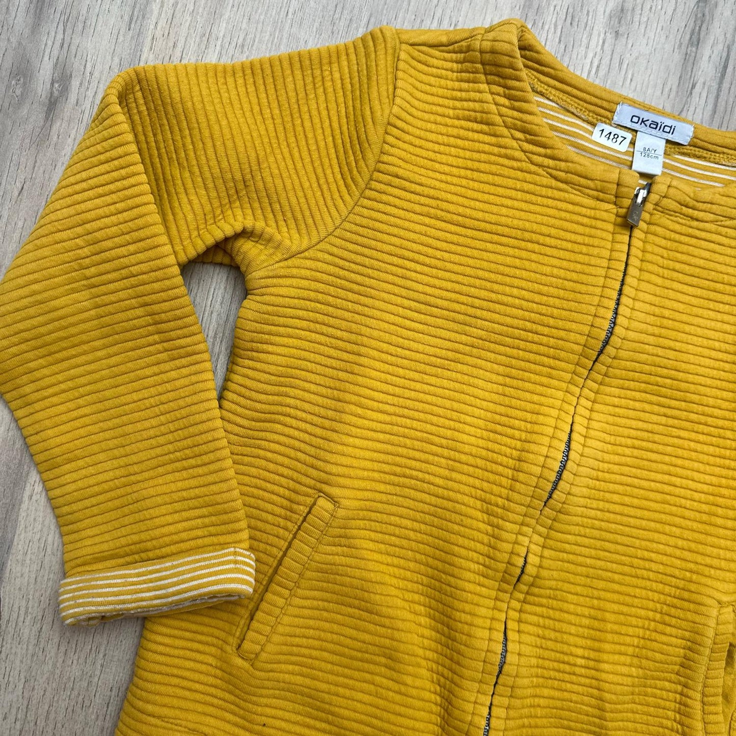 Gilet Okaïdi : 8 ans