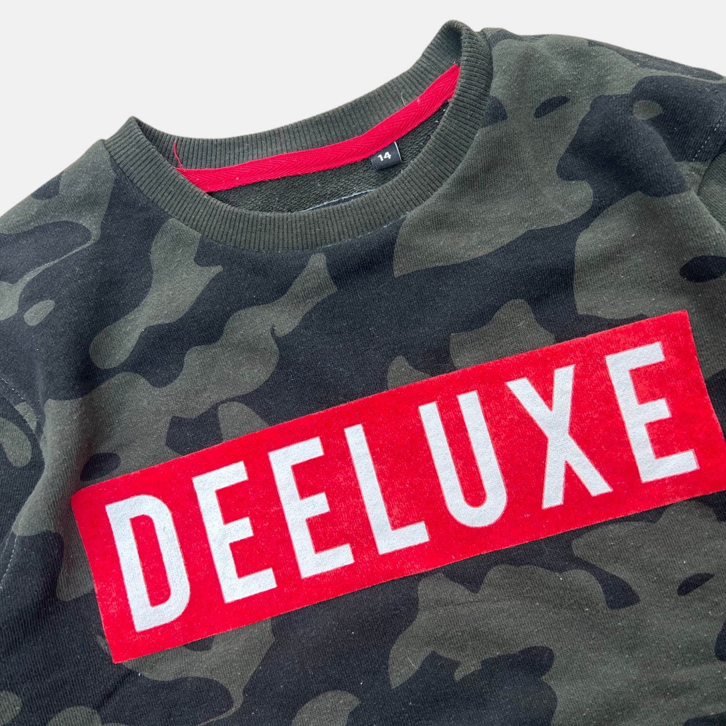 Pull Deeluxe : 14 ans