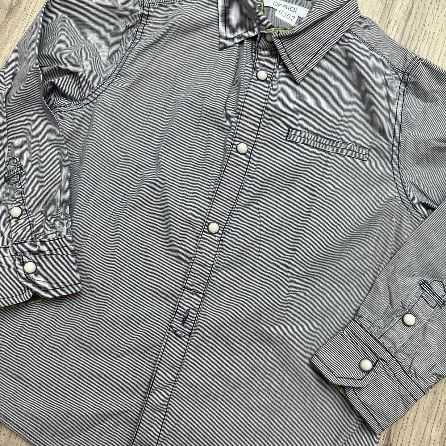 Chemise Okaïdi : 4 ans