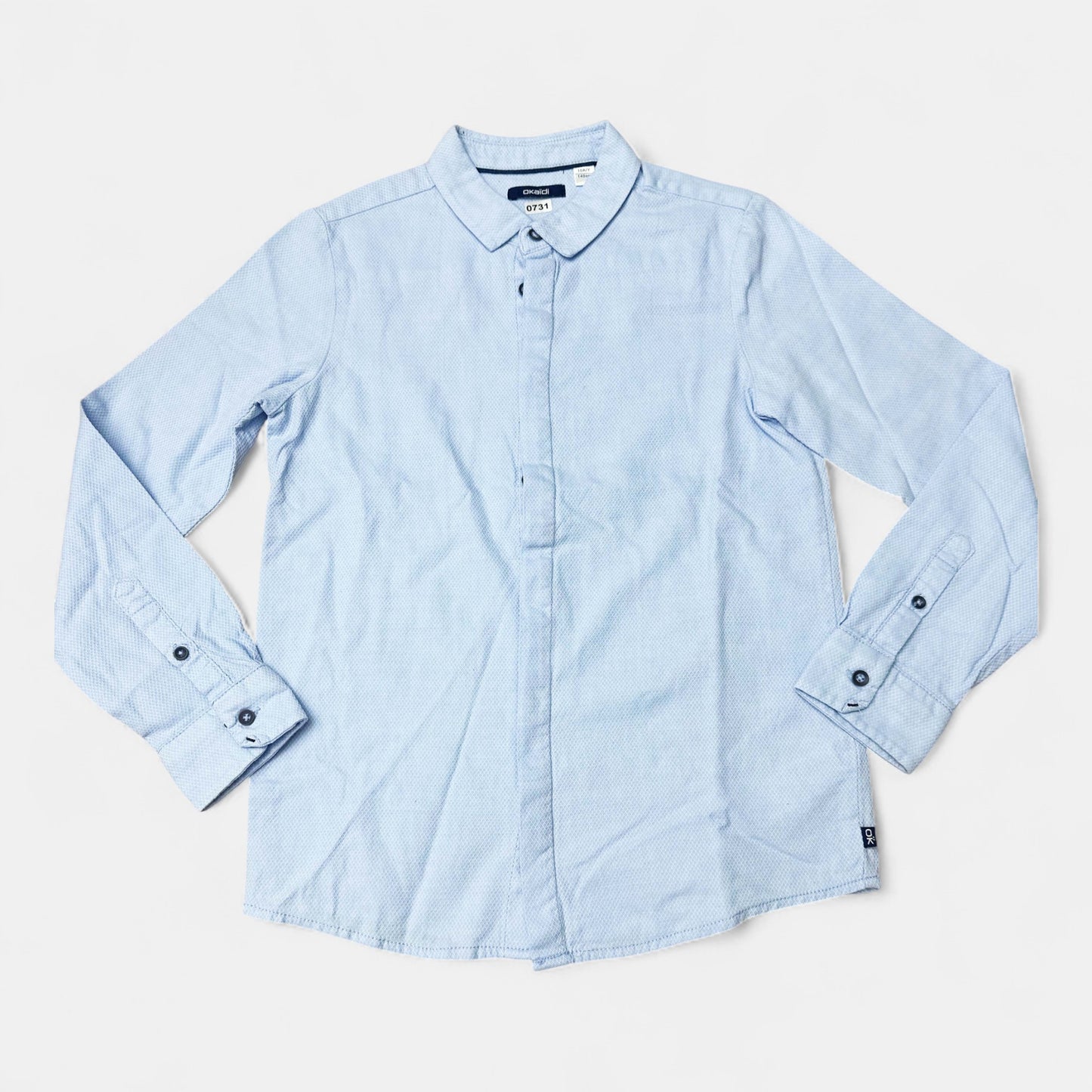 Chemise Okaïdi : 10 ans
