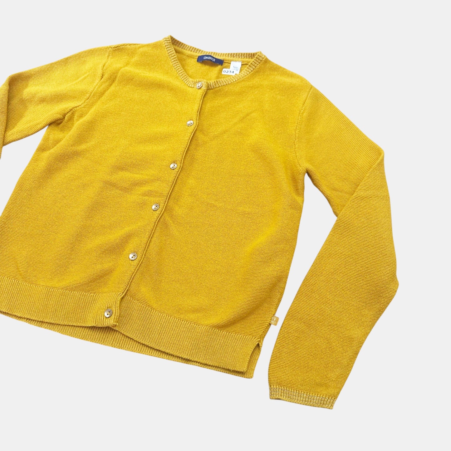 Gilet Okaïdi : 8 ans