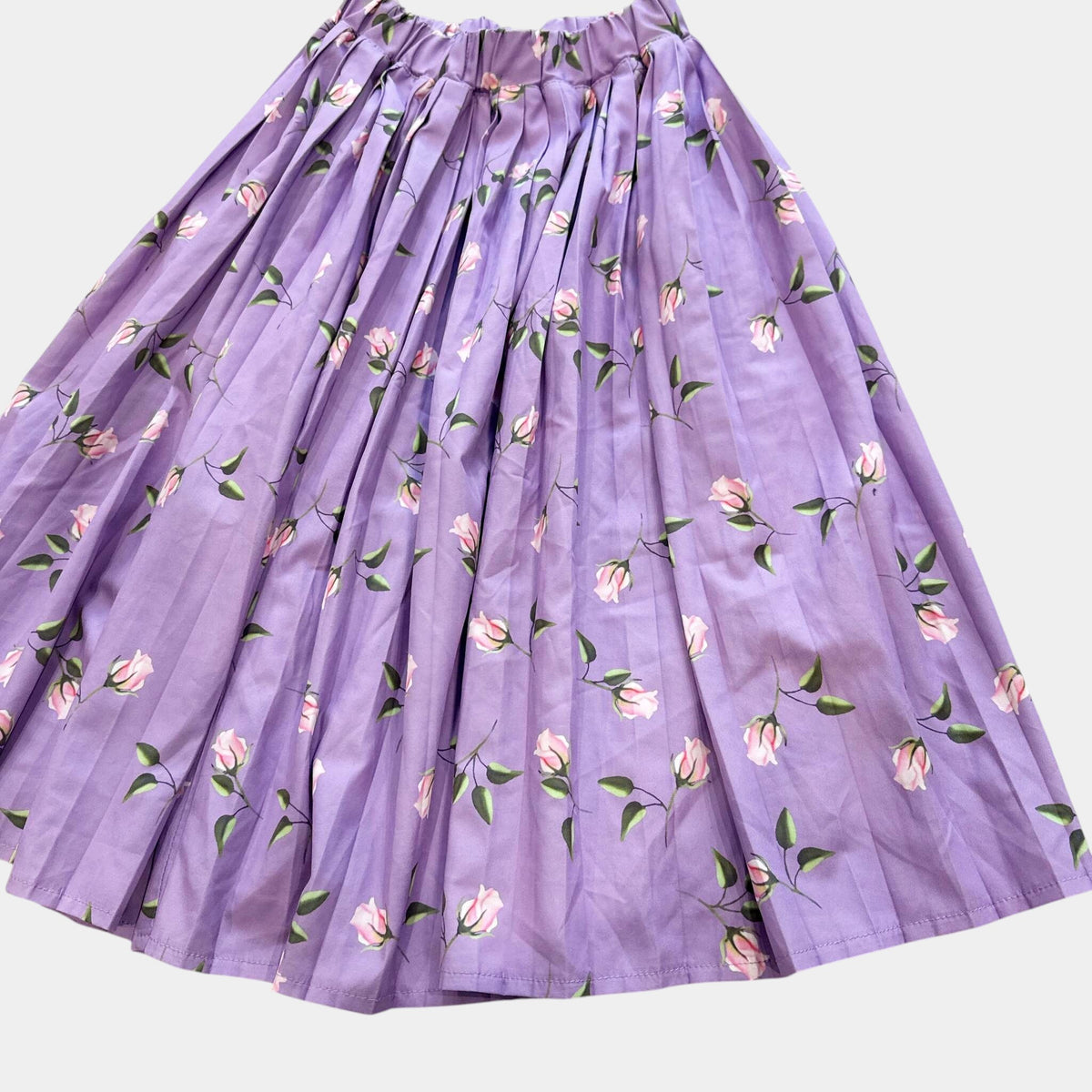 Jupe. Longue fleurs : 10 ans