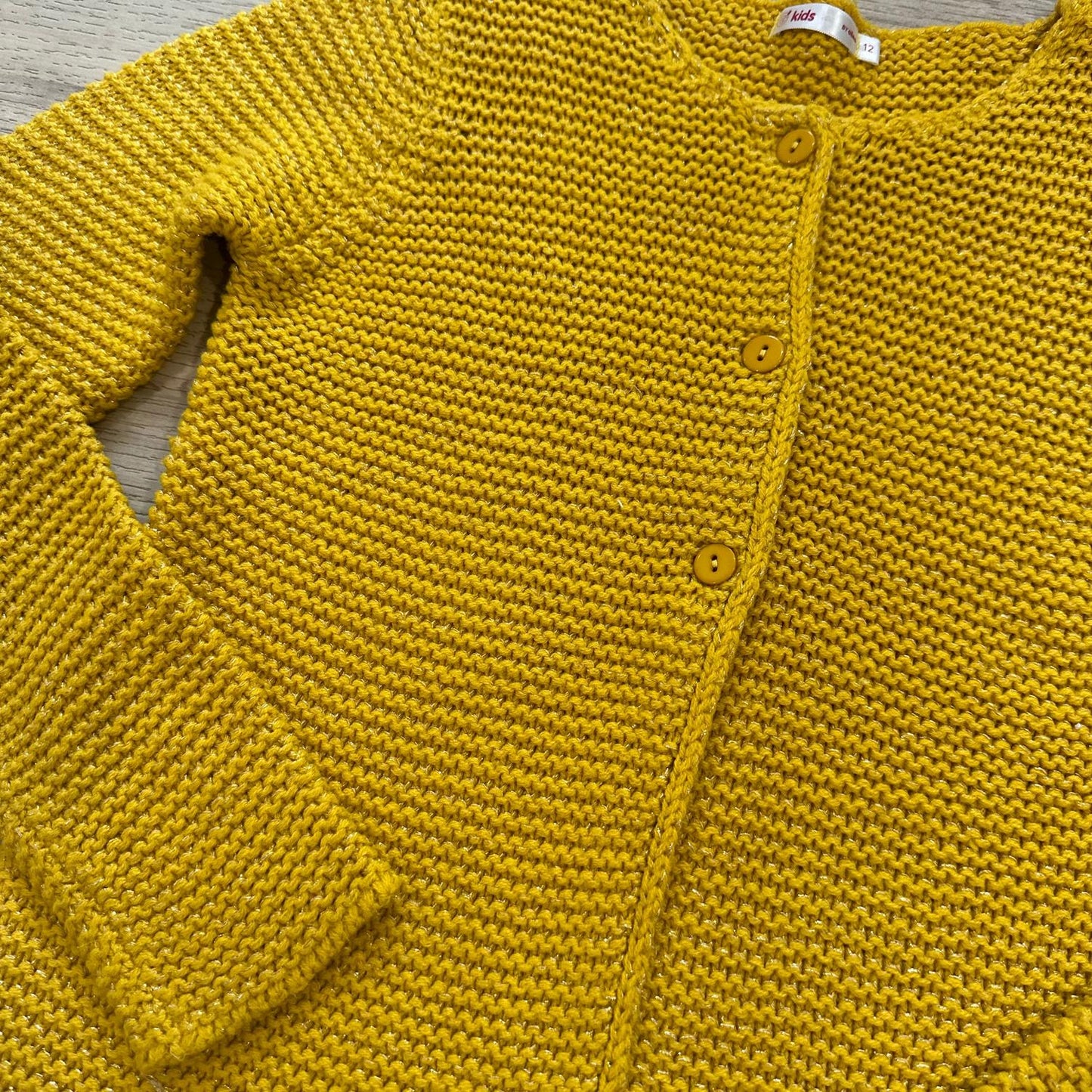 Gilet Gémo : 12 ans