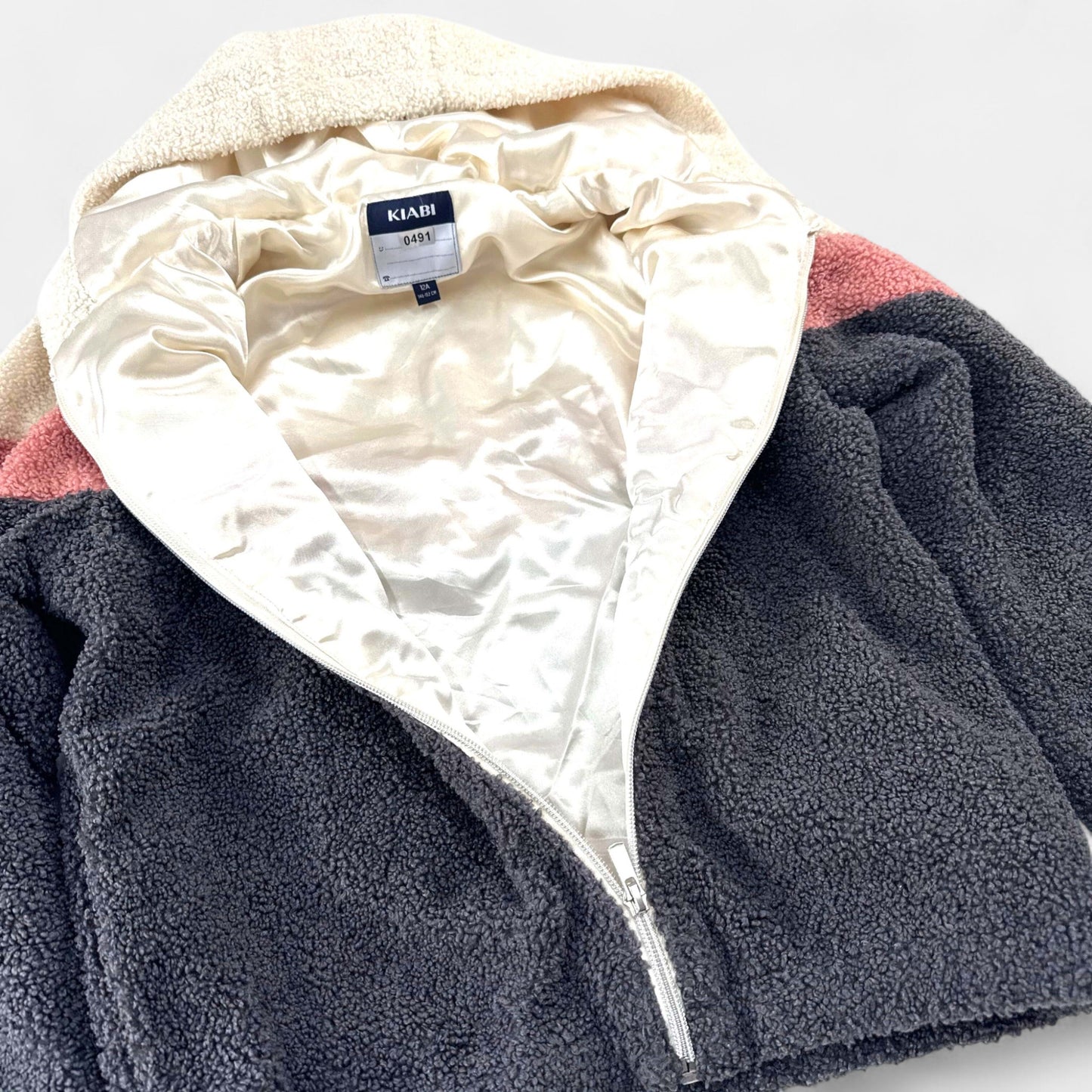 Veste  Kiabi : 12 ans