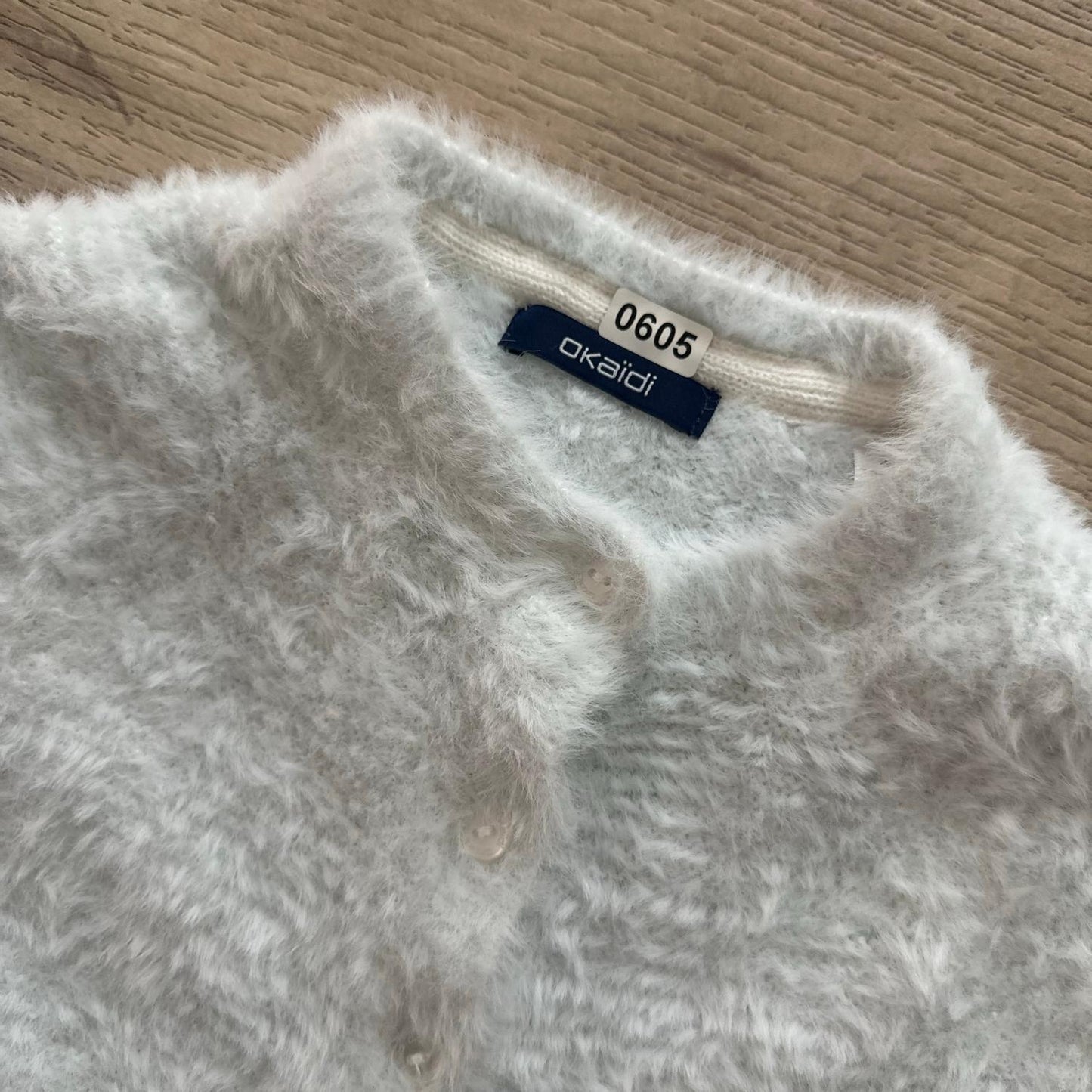 Gilet Okaïdi : 24 mois