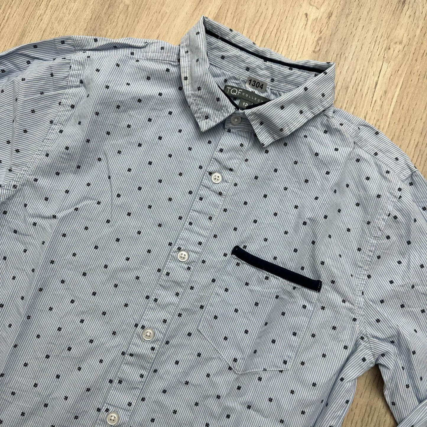 Chemise TQF : 12 ans